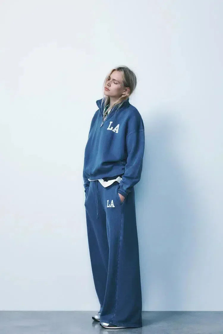 Damaris – Half-zip trui en broek met boorden – LA-loungeset